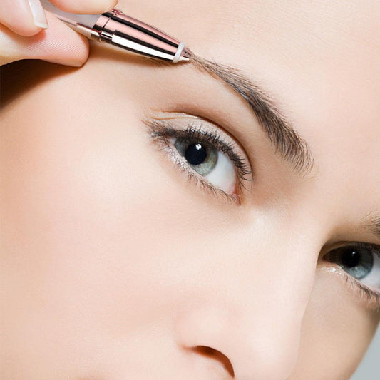 Close-up of a person shaping eyebrows with SourciLisse electric precision eyebrow epilator