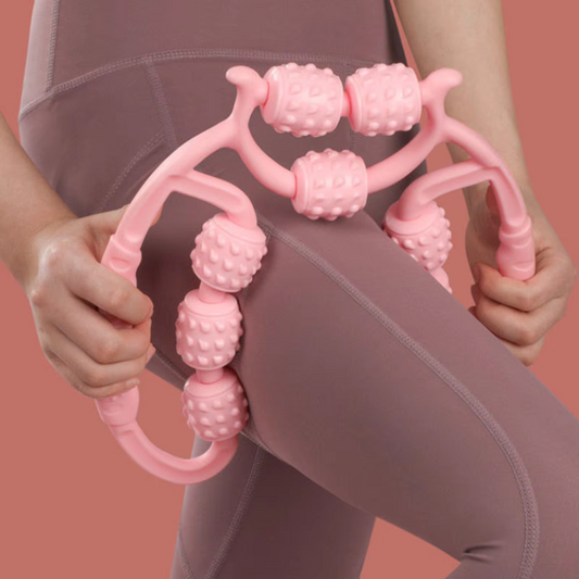 FlexiMass pink circular leg massager with textured rollers for muscle relaxation and improved circulation